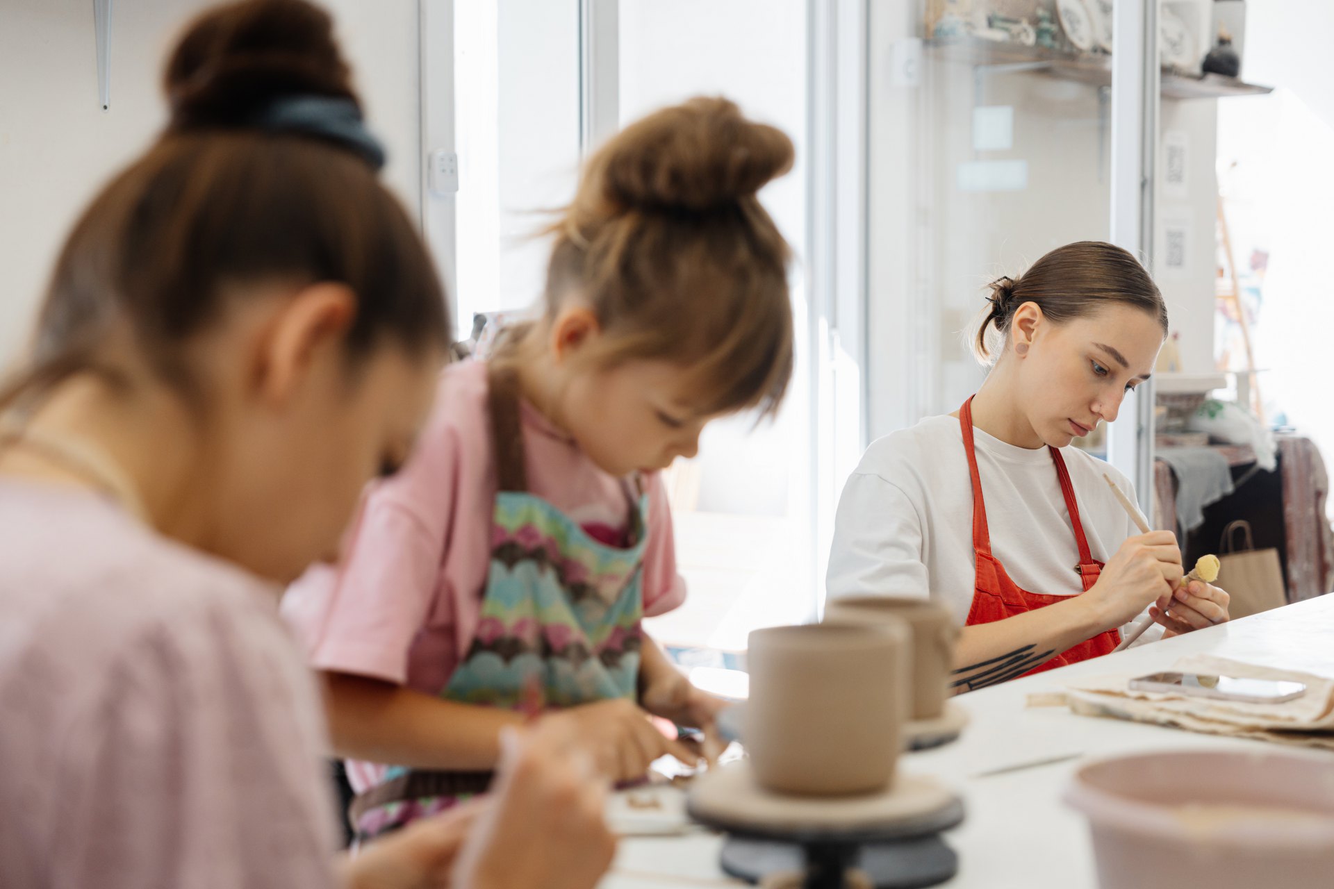 artistic-pottery-class-with-children-and-adults-en-2025-03-09-01-29-21-utc