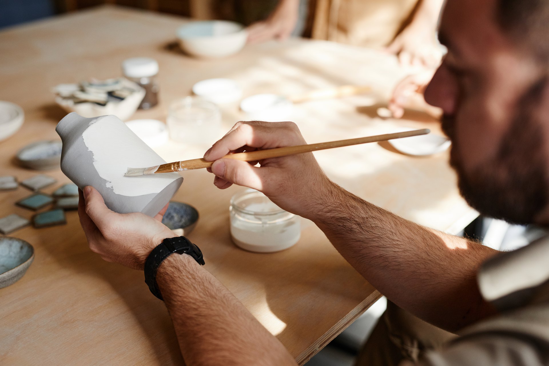 man-in-pottery-workshop-close-up-2025-03-08-18-14-56-utc